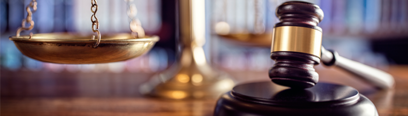 A hammer and gavel, representing Justice.