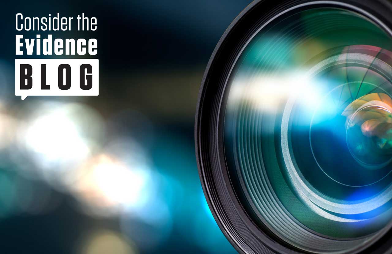 Camera Lens with Police Lights Shinning 